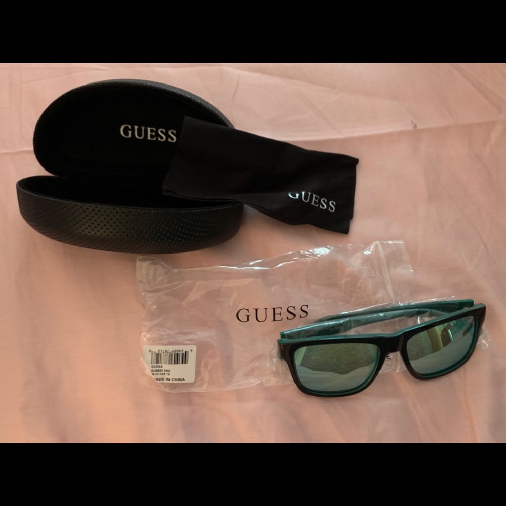 Guess green w a Black hint shades